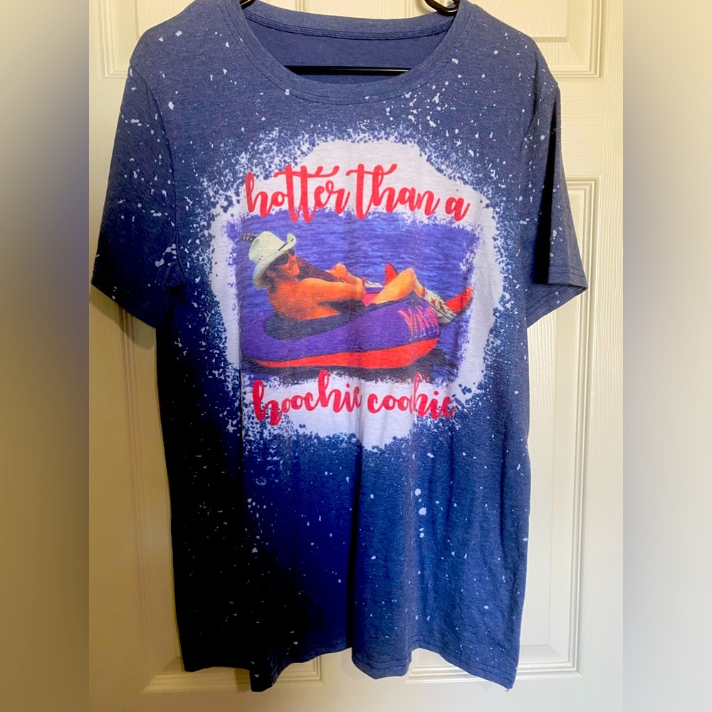 Free People Blue T-shirt! “Hotter than a hoochie coochie”. Size Large